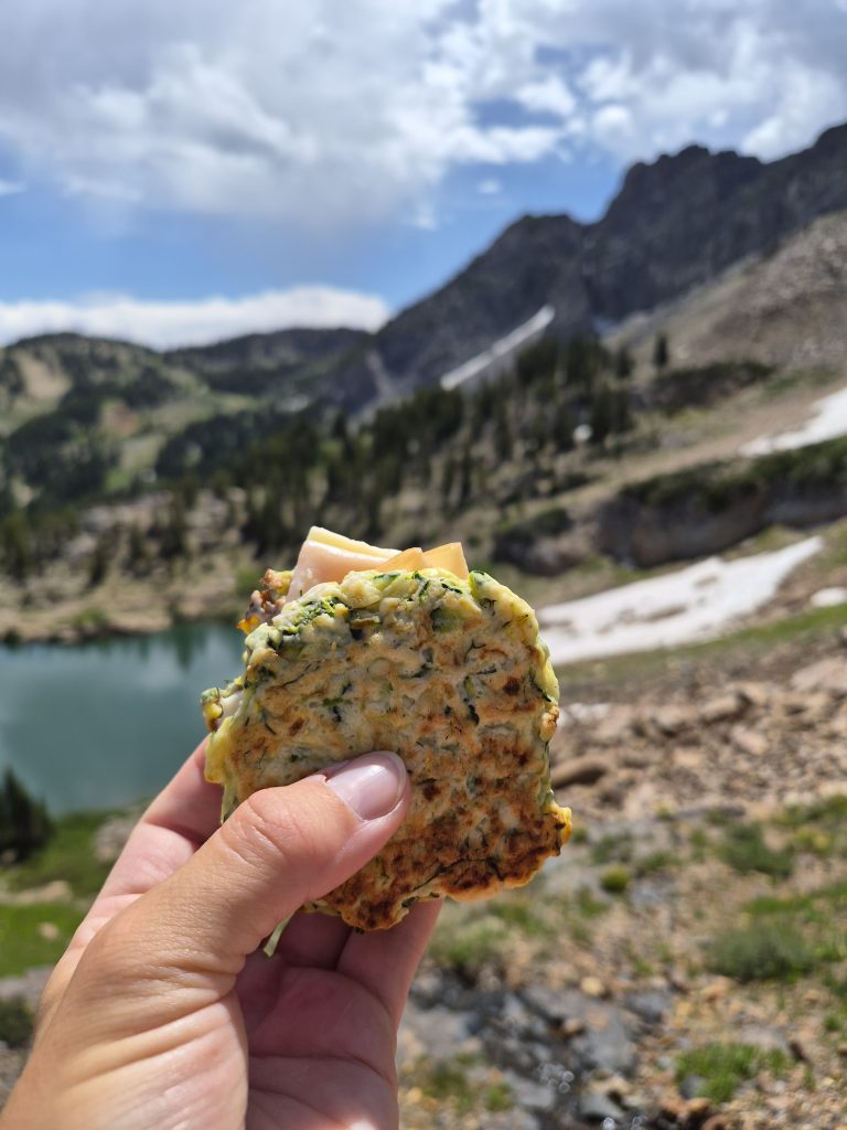 crispy zucchini fritters as sandwich bread for a simple lakeside lunch